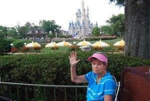 Georgia takes a break, with Cinderella's Castle in the background